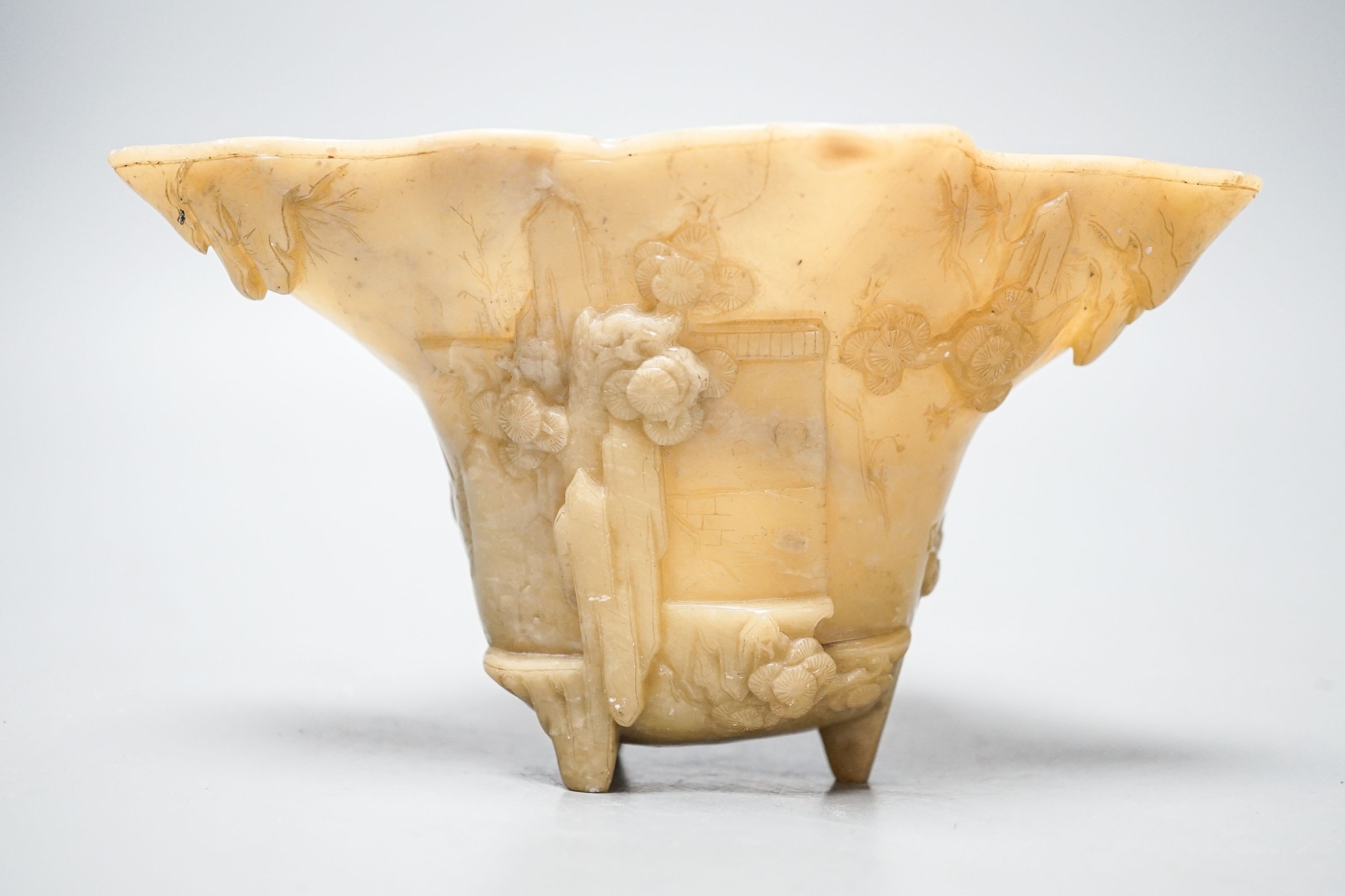 A Chinese carved soapstone libation cup, 19cm